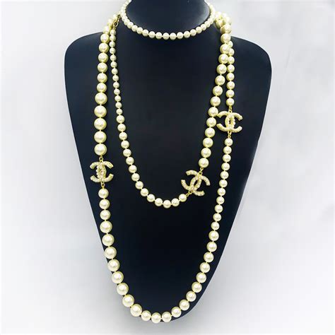 replica chanel long pearl necklace gold|cheap knock off chanel jewelry.